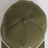 Green cap with white rim and logo on a light gray background