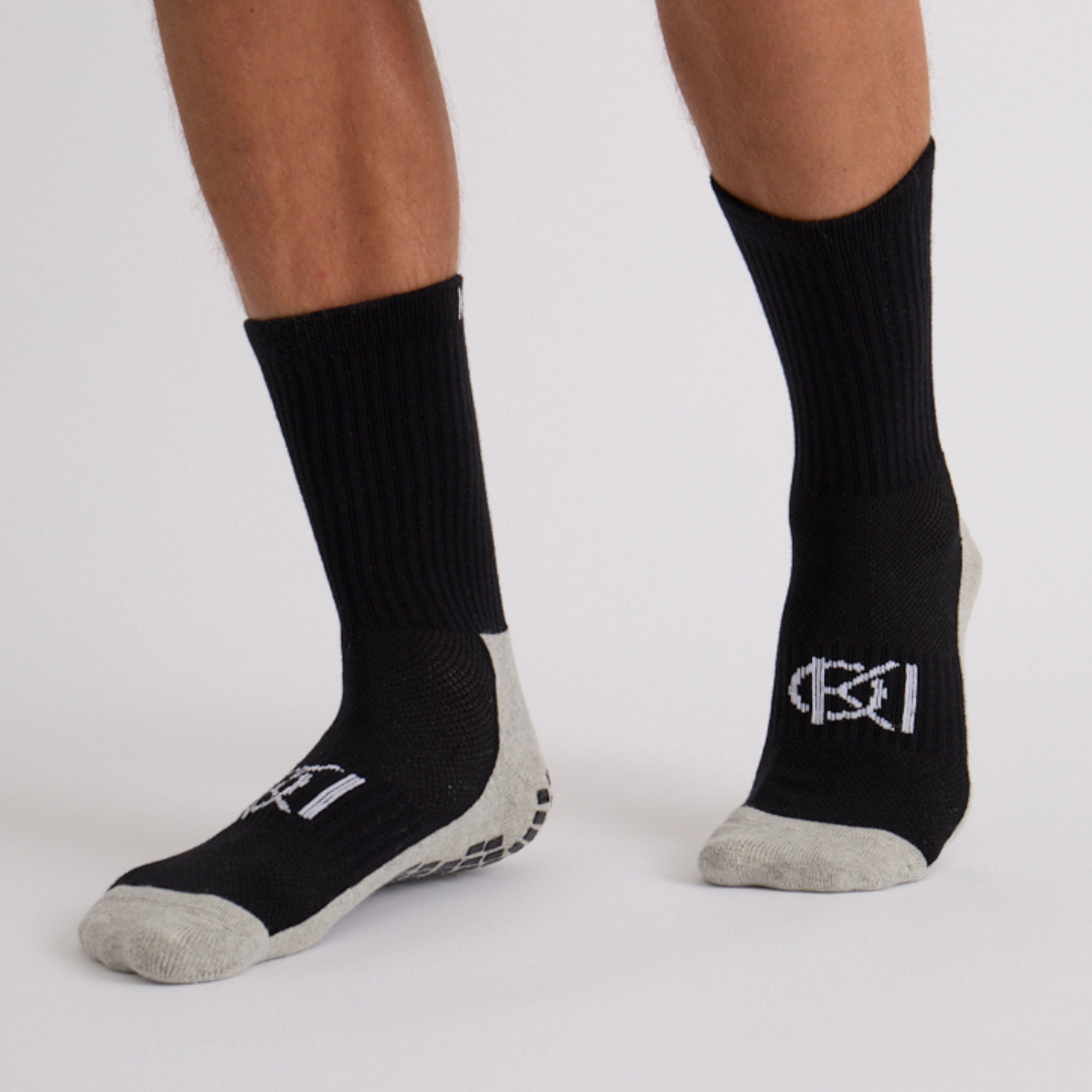 Mens black crew golf socks, classic colour, modern performance.