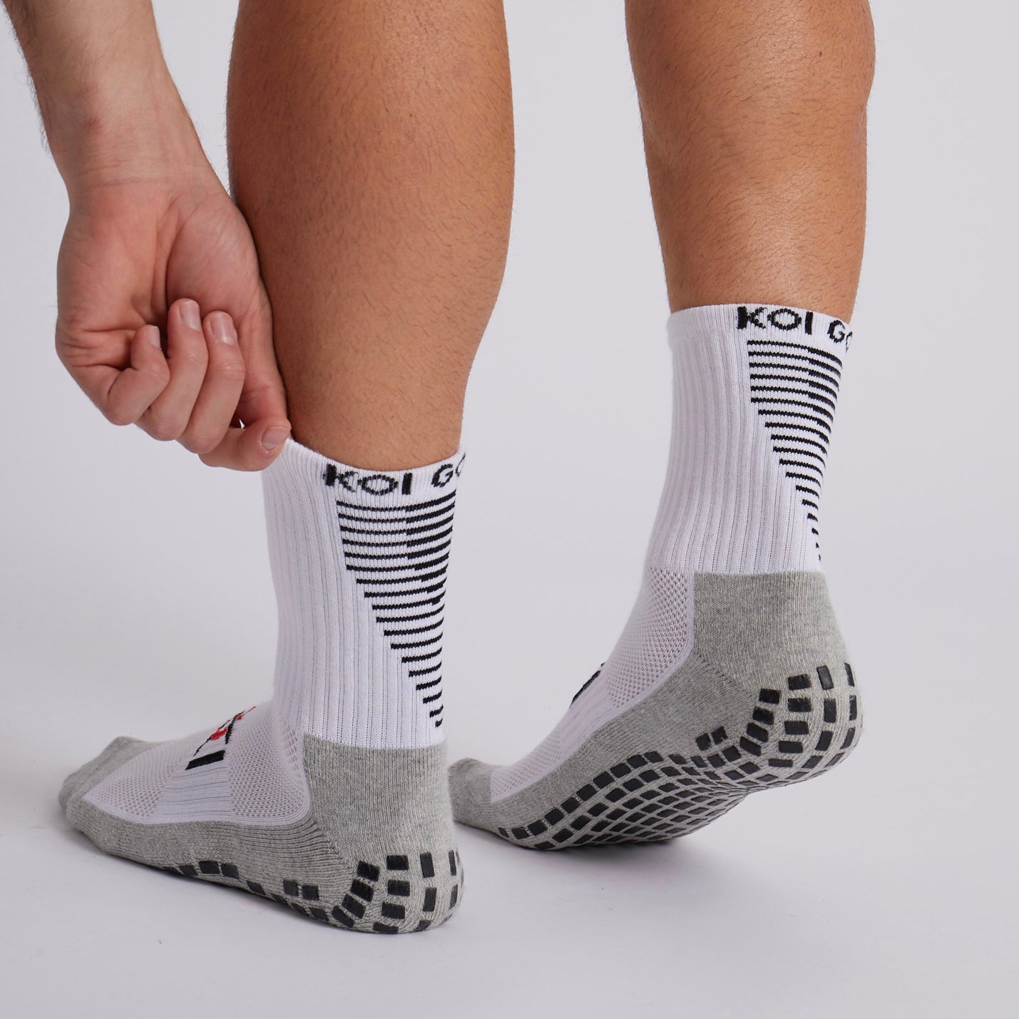 Koi Golf white crew socks for men – elegant and performance-driven design