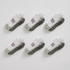 Set of six baby socks with black and red patterns on a white background