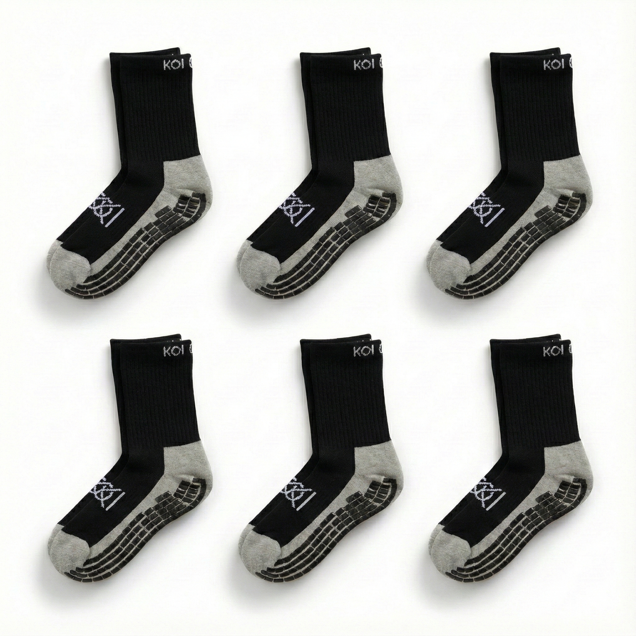 Set of six black socks with gray toes and heels on a white background
