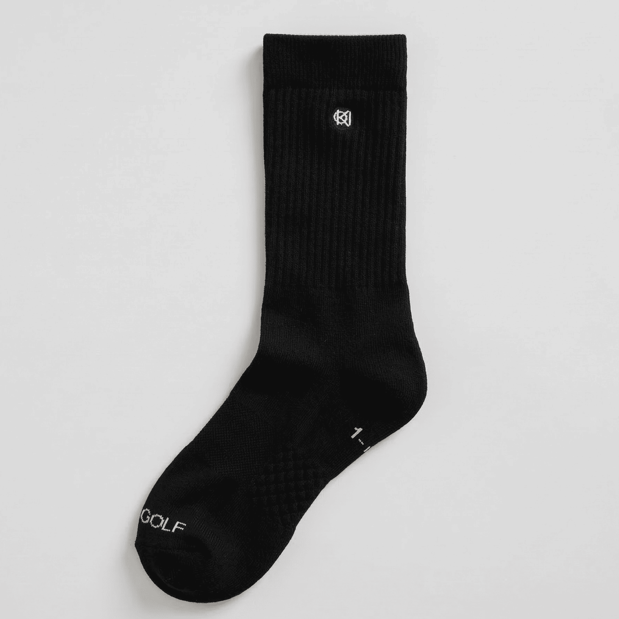 Black sock with a logo on a light gray background