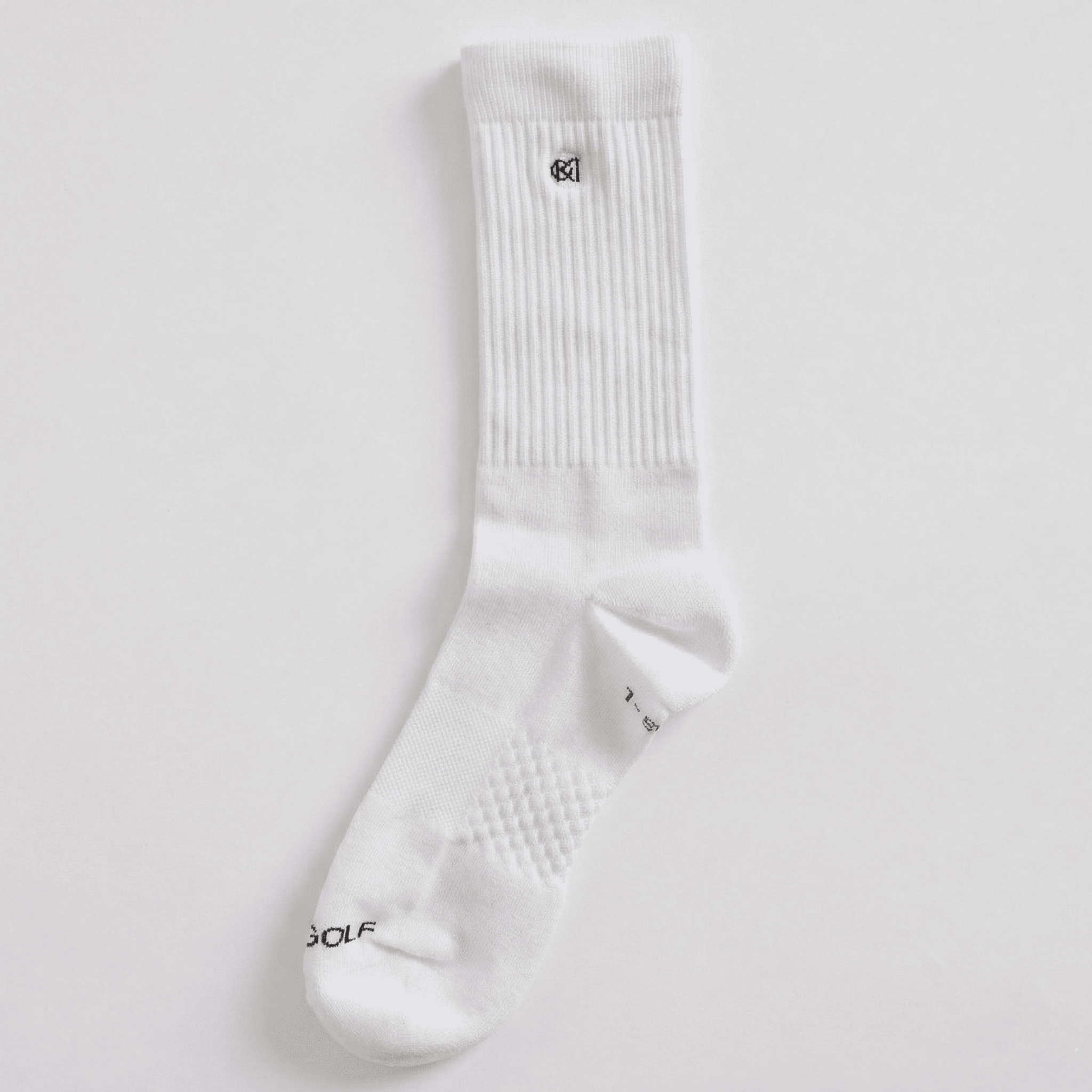 White sock with a logo on a light gray background