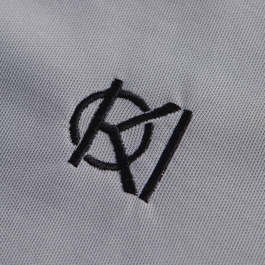 koi golf logo on grey golf polo